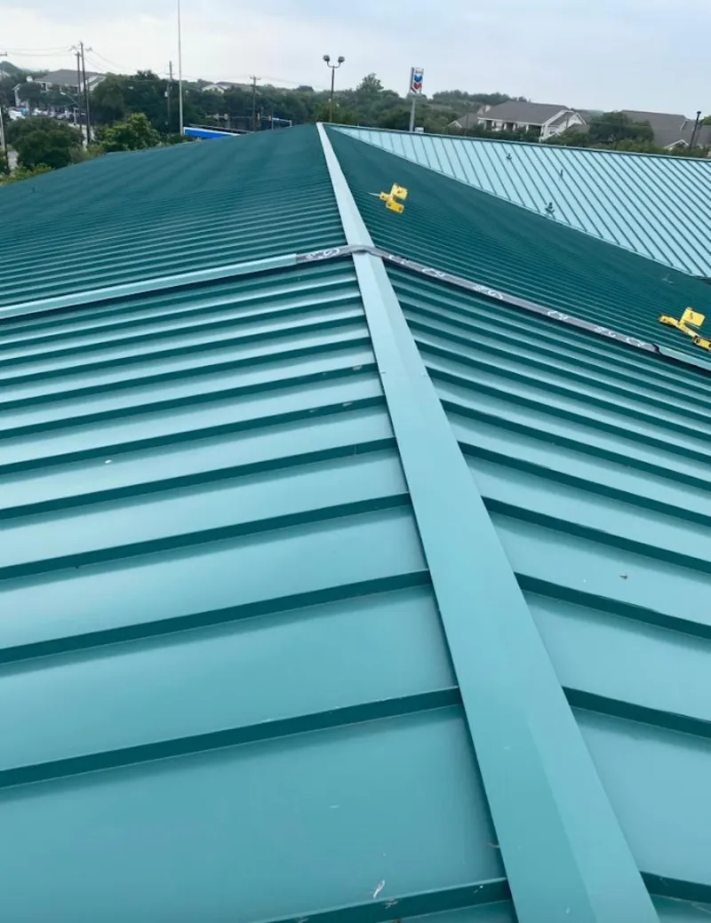 Green commercial metal roof ridge and valley for Metal Roof Repair in Longview