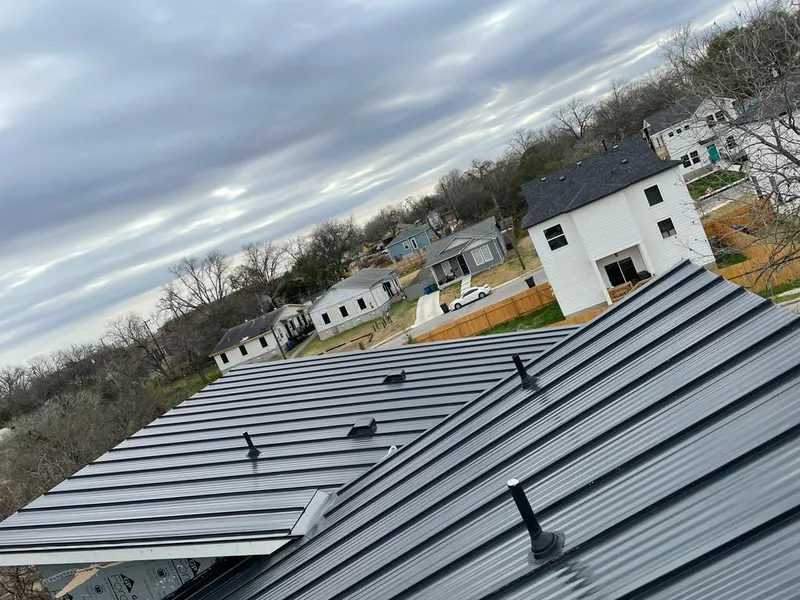 Standing seam metal roof panels with vents for Skylight Repair in Longview